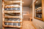 Bunk room is perfect for the kids with a twin over twin bunk and two extra twins
